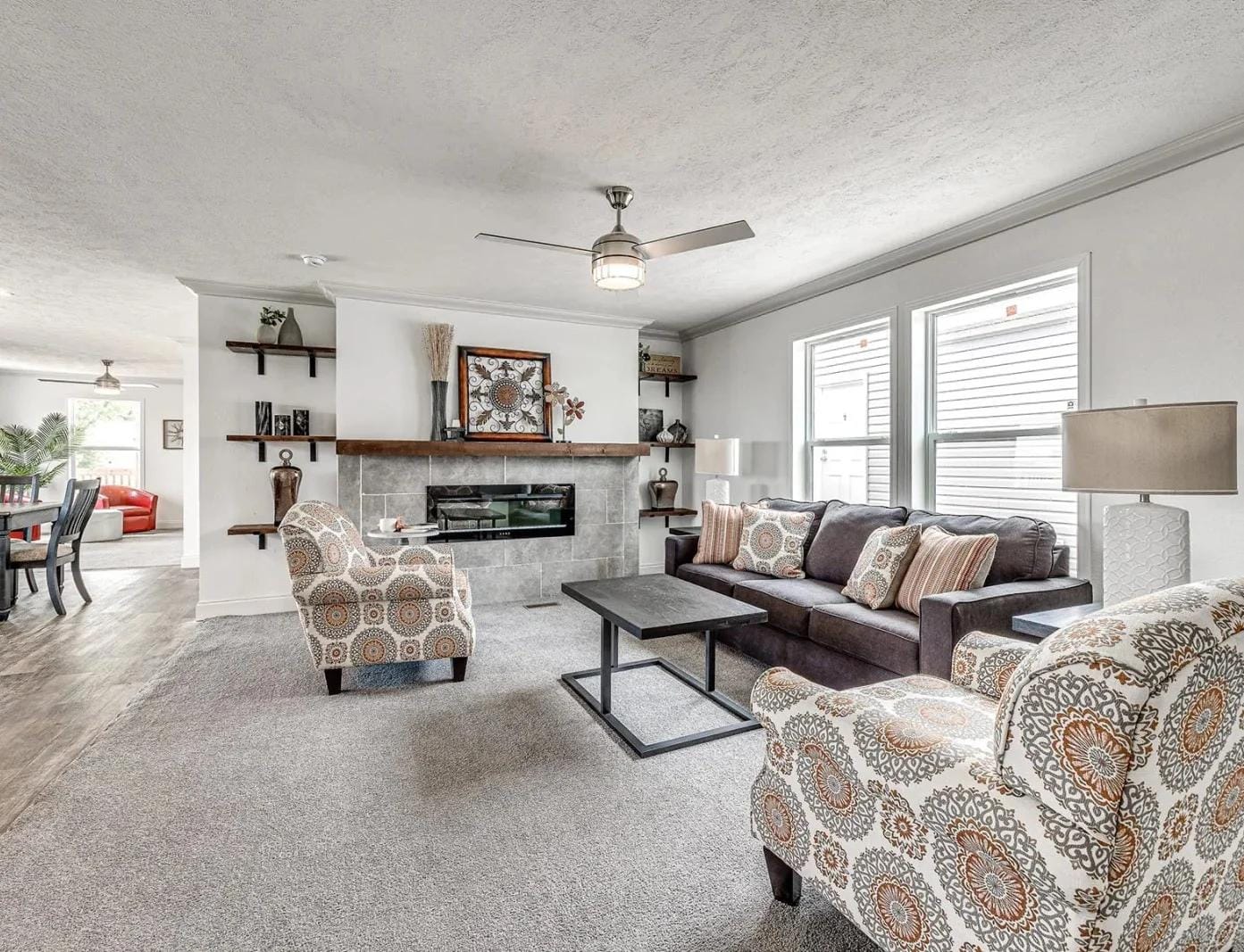 A living room in a modular home with comfortable furniture.